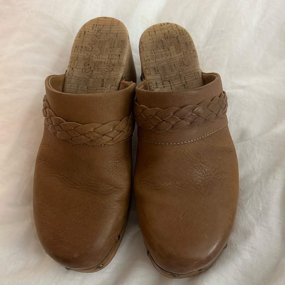 Brown clogs with braid across the top